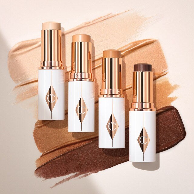 CHARLOTTE TILBURY - Unreal Skin Sheer Glow Tint - Stick Fond de teint Hydratant- 5 Medium