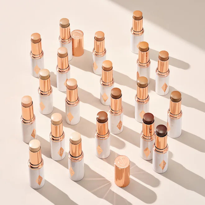 CHARLOTTE TILBURY - Unreal Skin Sheer Glow Tint - Stick Fond de teint Hydratant- 5 Medium