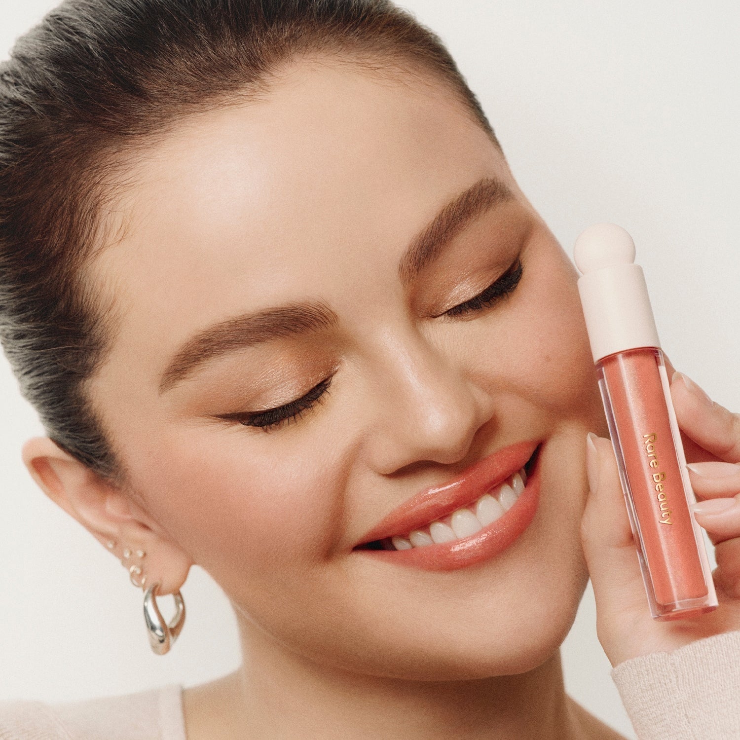 Rare Beauty - Positive Light Luminizing Lip Gloss- Ref Flicker